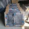 Aluminum sliding windows stacked and wrapped for warehouse storage