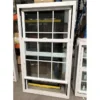 Custom vinyl double hung window produced in non-standard height and sash width